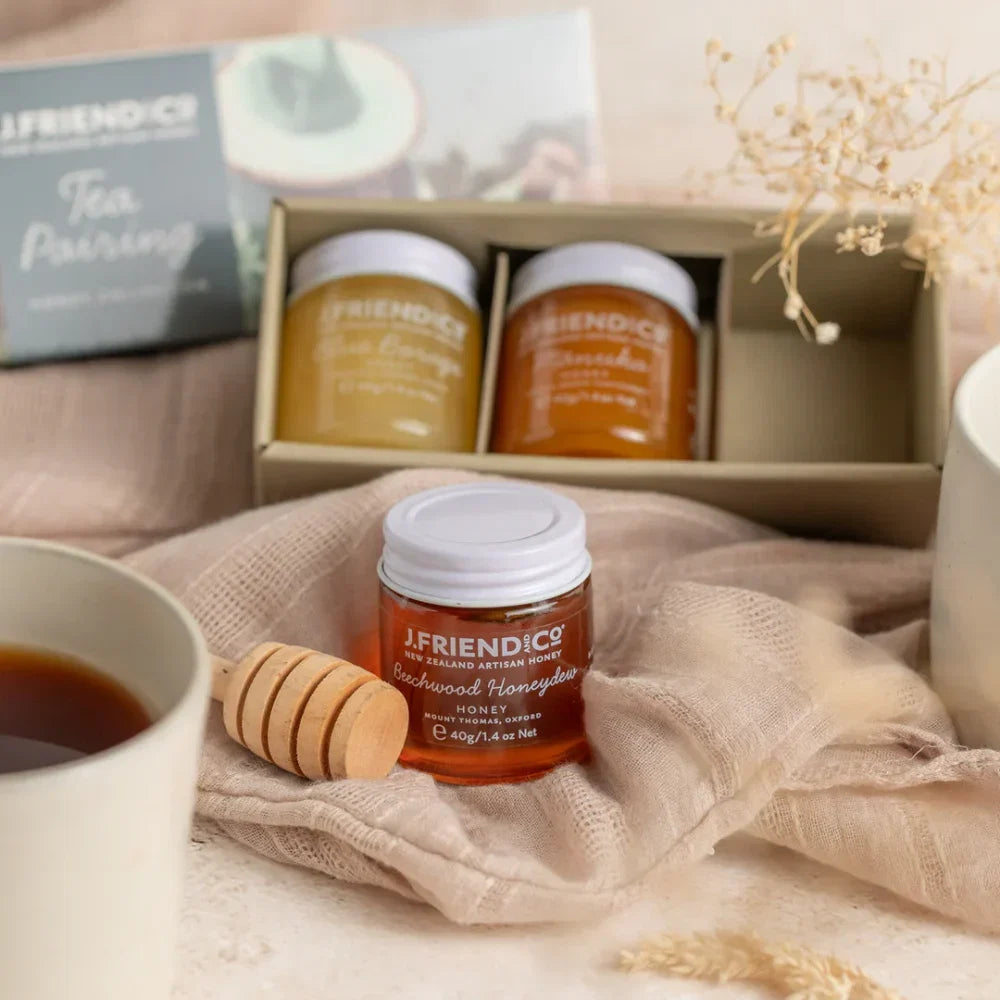 J.Friend and Co honey jars with a wooden dipper and tea